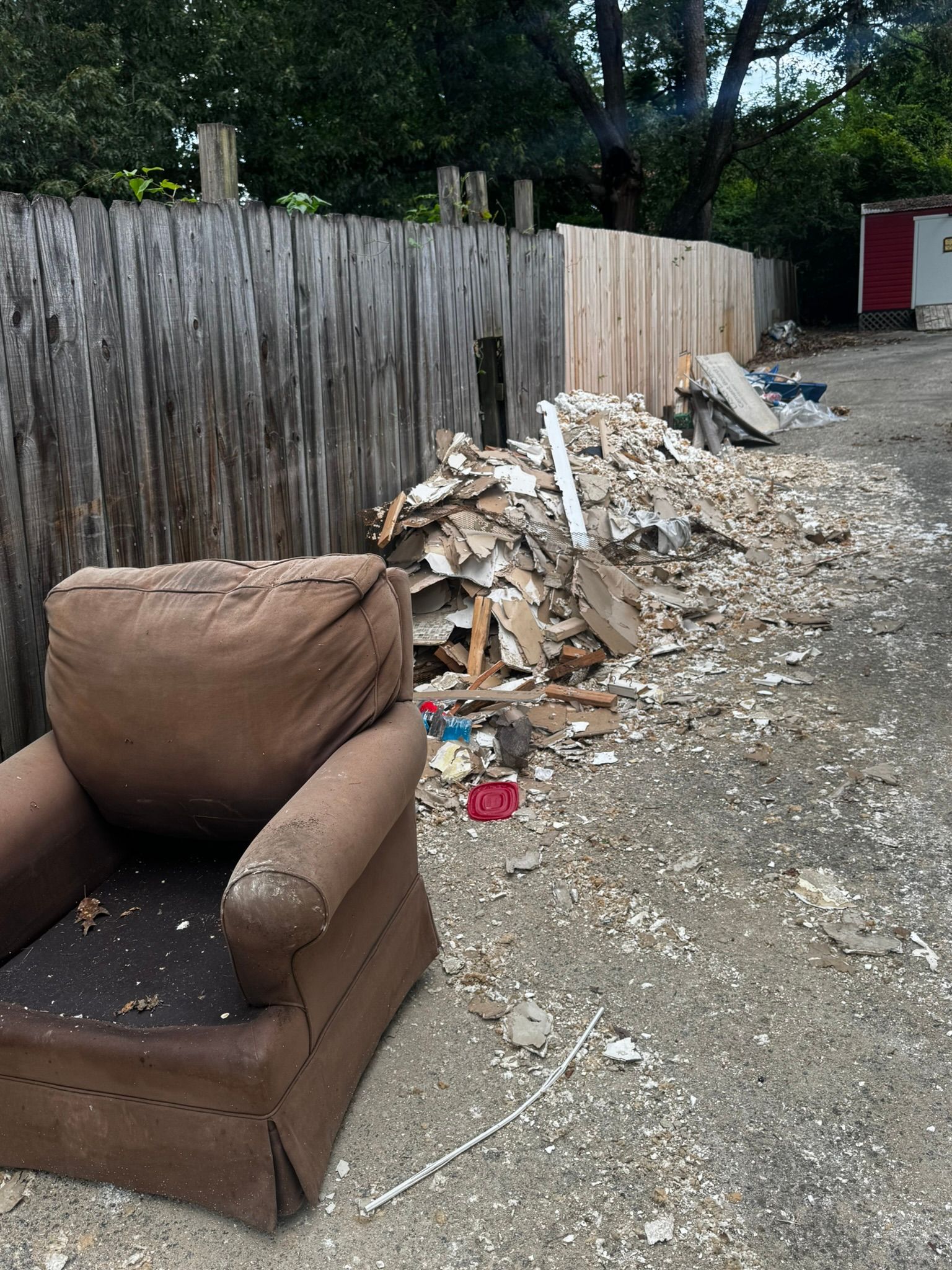 Furniture and construction debris ready for SolidCrew to remove